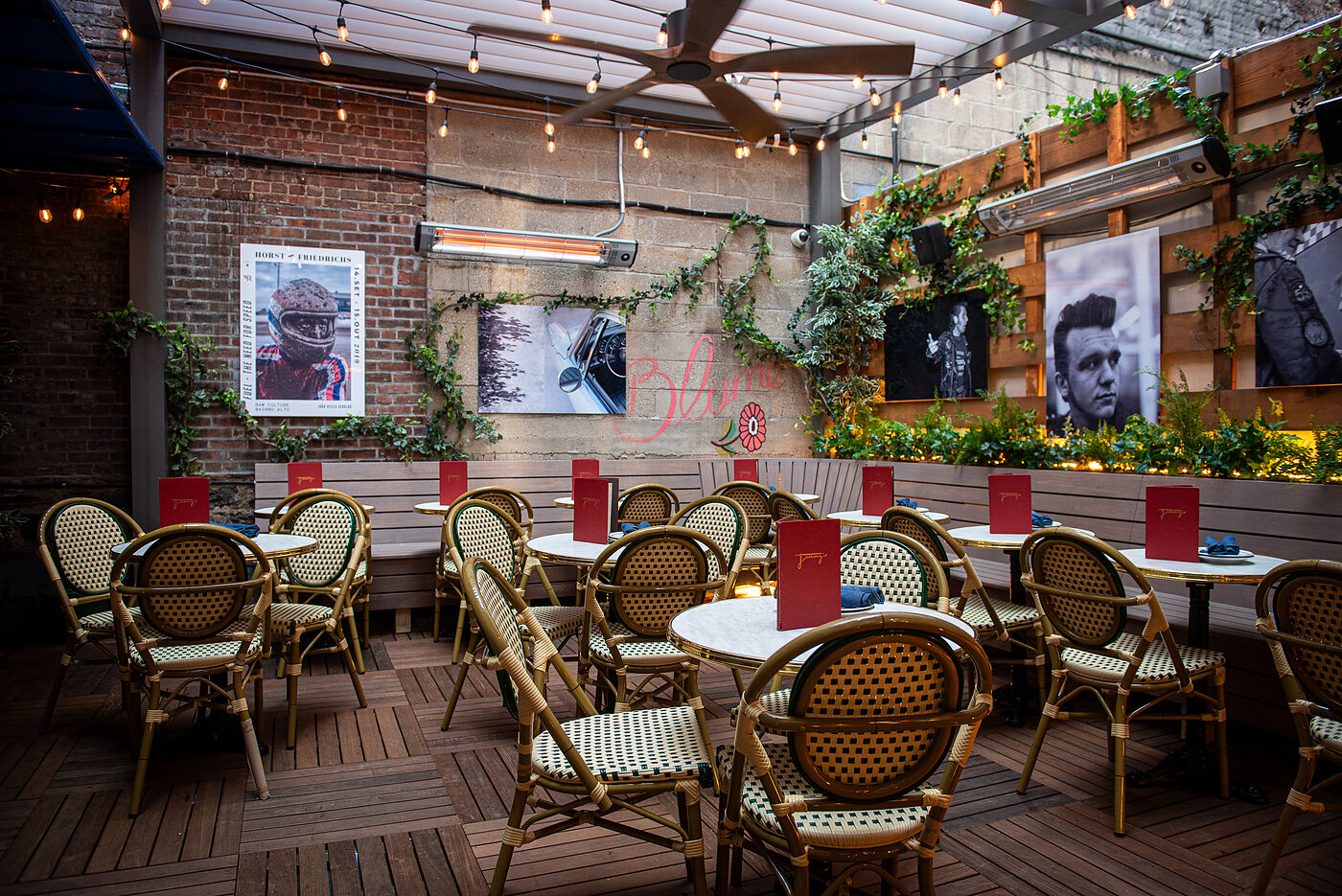 Jeremy's back patio — pergola, string lights, cafe chairs