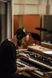 a man playing a piano